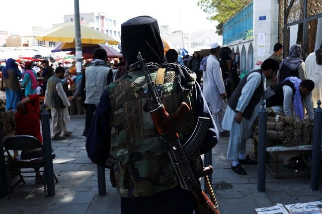a taliban soldier walks on a street in kabul afghanistan september 17 2021 photo reuters a taliban soldier walks on a street in kabul afghanistan september 17 2021 photo reuters