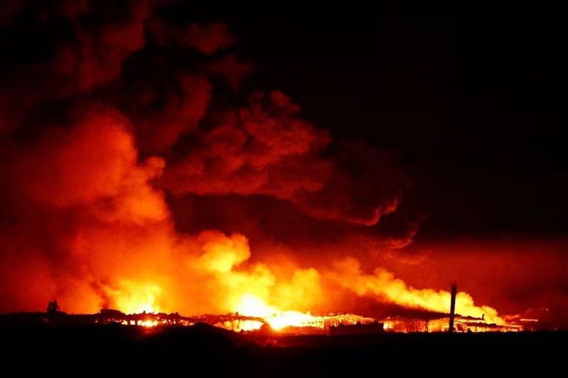 Fire burns in Gaza as seen from southern Israel, December 15, 2023. PHOTO: REUTERS