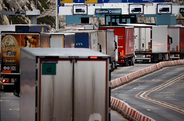 lorries queue in at the border control of the port of dover britain january 15 2021 photo reuters