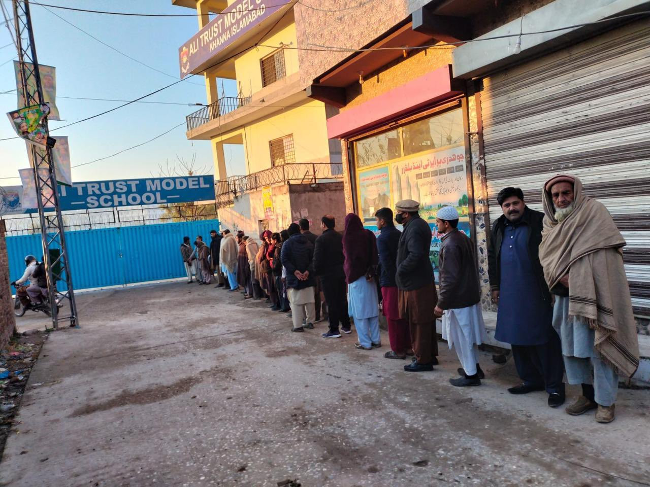 voters waiting outside a polling station in islamabad photo twitter fawadchaudhry