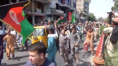 several killed in flag waving protests against taliban in afghanistan