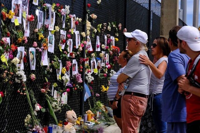 five dead 156 still missing in florida building collapse as searchers race against time five dead 156 still missing in florida building collapse as searchers race against time