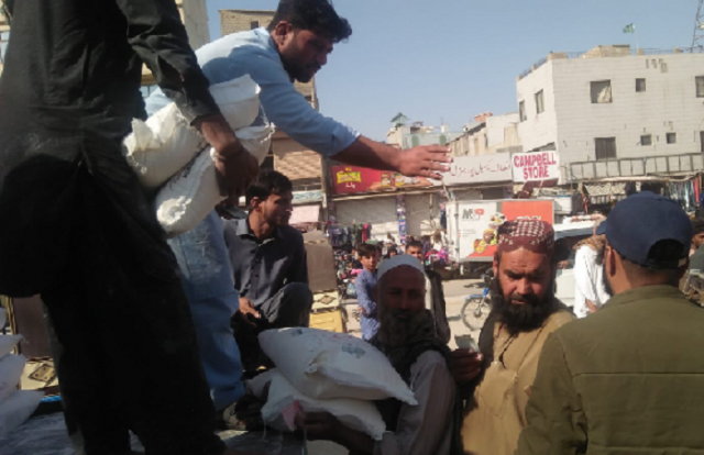 chaotic scenes were witnessed in all parts of sindh where flour was being sold through mini trucks or vans photo twitter irfanmirwanii chaotic scenes were witnessed in all parts of sindh where flour was being sold through mini trucks or vans photo twitter irfanmirwanii
