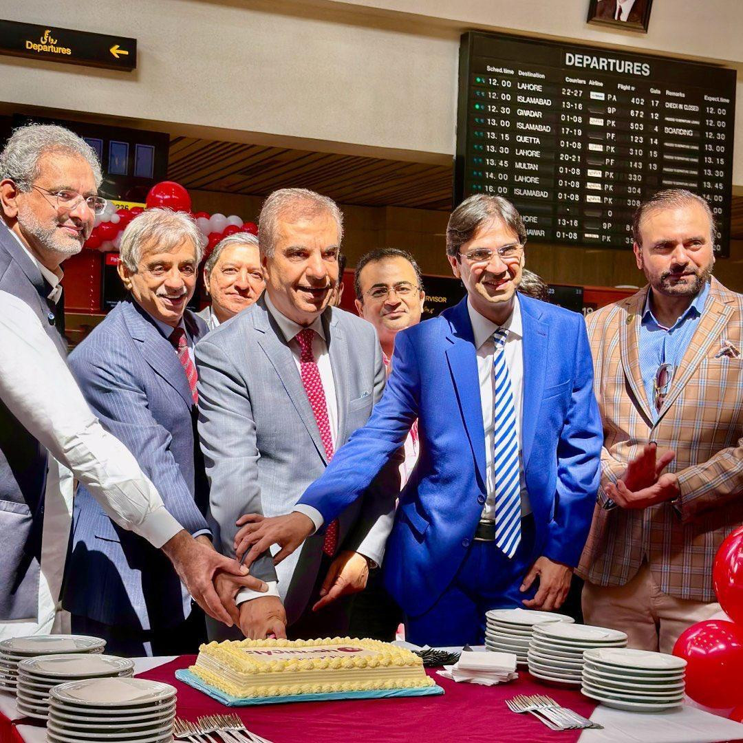 shahid khaqan abbasi zulfiqar ali lakhani senator saleem mandviwala group ceo air arabia arman yahya ceo fly jinnah cut cake at the launch of fly jinnah airline on monday photo express