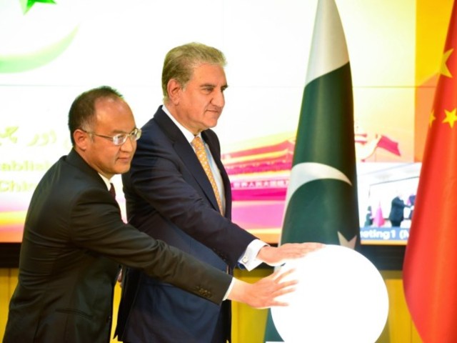 foreign minister shah mahmood qureshi and chinese ambassador nong rong press the button at a virtual ceremony simultaneously held in islamabad and beijing to launch celebrations marking 70 years of friendship photo app