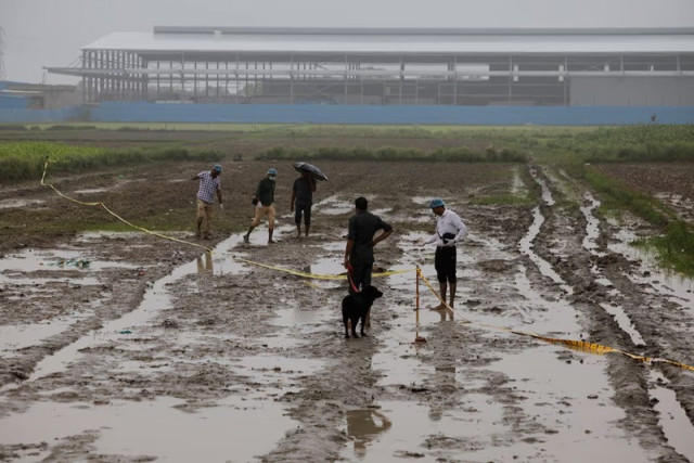 forensic team members work at the site where a stampede occurred in hathras district of uttar pradesh india july 3 2024 photo reuters forensic team members work at the site where a stampede occurred in hathras district of uttar pradesh india july 3 2024 photo reuters