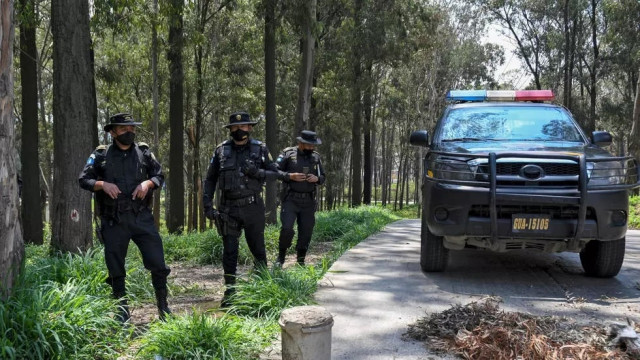 police officers patrol south of guatemala city photo afp police officers patrol south of guatemala city photo afp
