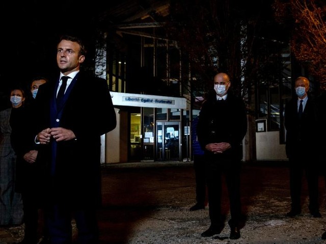 french president emmanuel macron flanked by french interior minister gerald darmanin and french education minister jean michel blanquer speaks to the press following a stabbing attack in the conflans sainte honorine suburb of paris france october 16 2020 photo reuters