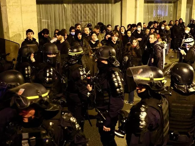 protesters are surrounded by riot police during a demonstration on the day the national assembly debates and votes on two motions of no confidence against the french government tabled by centrist group liot and far right rassemblement national party for its use of article 49 3 a special clause in the french constitution to push the pensions reform bill through the national assembly without a vote by lawmakers in paris france march 20 2023 photo reuters protesters are surrounded by riot police during a demonstration on the day the national assembly debates and votes on two motions of no confidence against the french government tabled by centrist group liot and far right rassemblement national party for its use of article 49 3 a special clause in the french constitution to push the pensions reform bill through the national assembly without a vote by lawmakers in paris france march 20 2023 photo reuters