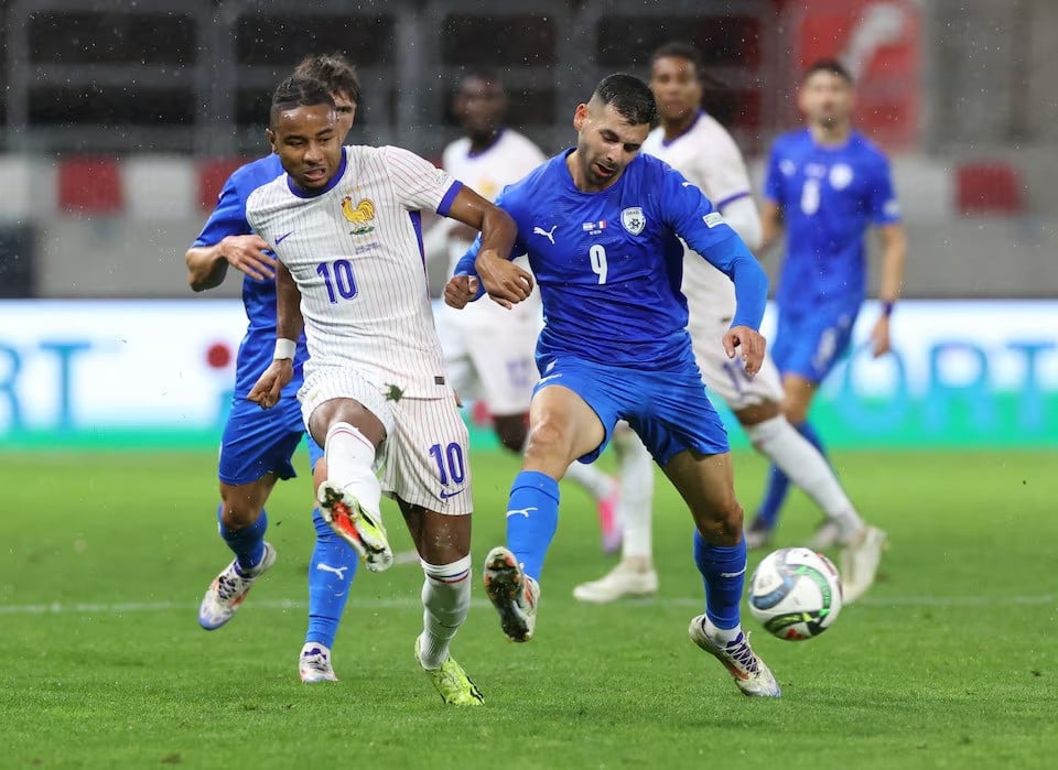 france s christopher nkunku in action with israel s tai baribo during uefa nations league group a2 match between israel and france at bozsik arena budapest hungary on october 10 2024 photo reuters