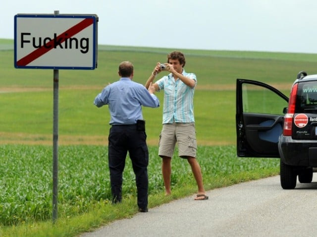 tourists taking pictures of the road sign of the village of fucking some visitor have reportedly even stolen the signposts photo afp tourists taking pictures of the road sign of the village of fucking some visitor have reportedly even stolen the signposts photo afp