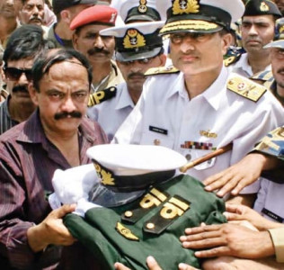 naval base attack funeral prayers for slain officer