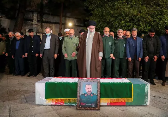 iran s supreme leader ayatollah ali khamenei pray next to the coffin of senior adviser for iran s revolutionary guards sayyed razi mousavi who was killed in an israeli air strike outside the syrian capital damascus during his funeral in tehran iran december 28 2023 office of the iranian iran s supreme leader ayatollah ali khamenei pray next to the coffin of senior adviser for iran s revolutionary guards sayyed razi mousavi who was killed in an israeli air strike outside the syrian capital damascus during his funeral in tehran iran december 28 2023 office of the iranian