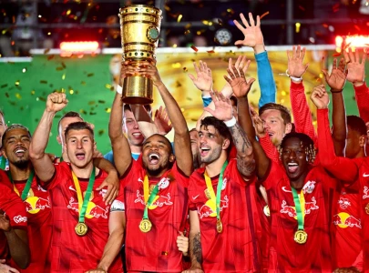 nkunku inspired leipzig defend german cup