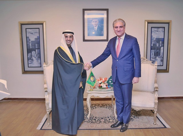 foreign minister shah mahmood qureshi receives secretary general of the gulf cooperation council nayef bin falah al hajraf at the extraordinary session of the oic foreign ministers in islamabad on dec 18 2021 photo twitter smqureshipti