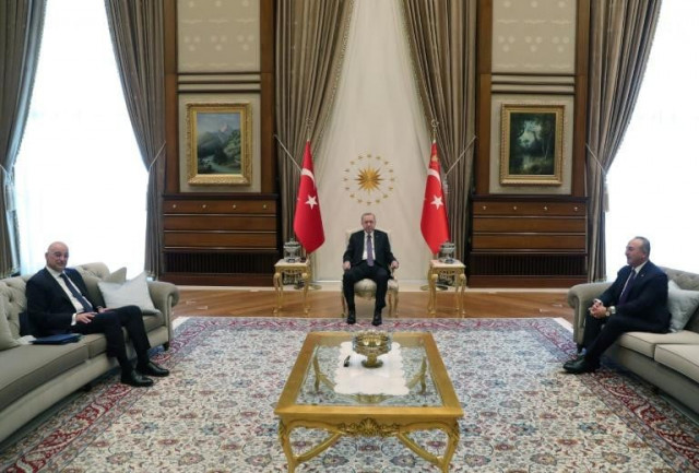 turkish president recep tayyip erdogan seated at centre receives greek foreign minister nikos dendias at left at the presidential complex in ankara mustafa kamaci photo afp turkish president recep tayyip erdogan seated at centre receives greek foreign minister nikos dendias at left at the presidential complex in ankara mustafa kamaci photo afp
