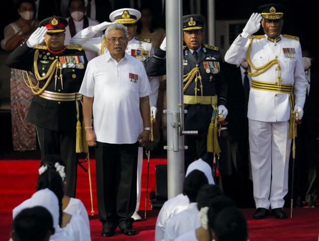 sri lanka s gotabaya rajapaksa sings the national anthem during the country s 74th independence day celebrations in colombo sri lanka february 4 2022 he resigned as president this month after fleeing the country reuters sri lanka s gotabaya rajapaksa sings the national anthem during the country s 74th independence day celebrations in colombo sri lanka february 4 2022 he resigned as president this month after fleeing the country reuters