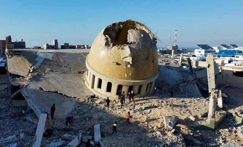 a mosque destroyed in israeli strikes during the conflict lies in ruin in khan younis in the southern gaza strip november 29 2023 photo reuters
