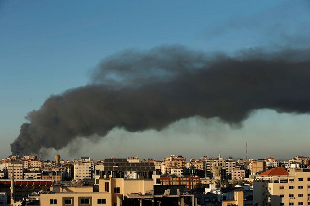 smoke rises amid a flare up of israeli palestinian violence in gaza may 15 2021 photo reuters