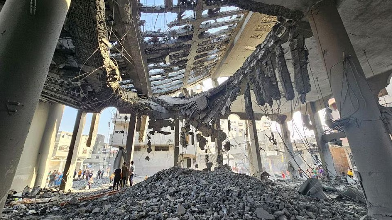 palestinians inspect the remains of a mosque destroyed in israeli strikes in the northern gaza strip october 22 2023 photo reuters