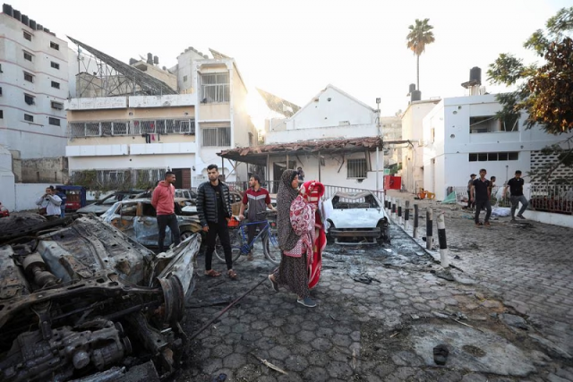 people inspect the area of al ahli hospital where hundreds of palestinians were killed in a blast in gaza city october 18 photo reuters file people inspect the area of al ahli hospital where hundreds of palestinians were killed in a blast in gaza city october 18 photo reuters file