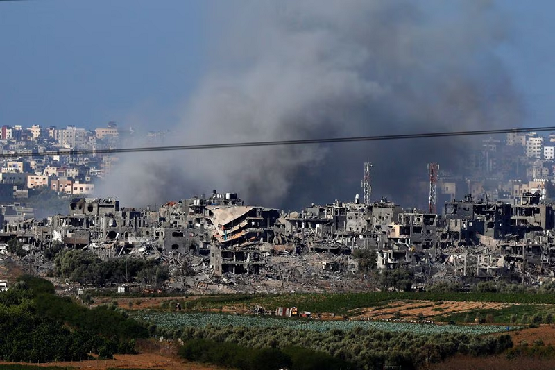 Smoke rises over Gaza, as seen from Israel's border with Gaza, in southern Israel October 30, 2023. PHOTO: REUTERS