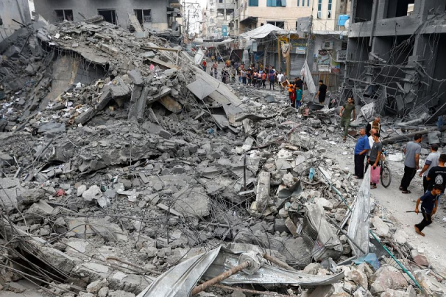 palestinians inspect the damage in the aftermath of israeli strikes in khan younis southern gaza strip october 10 photo reuters palestinians inspect the damage in the aftermath of israeli strikes in khan younis southern gaza strip october 10 photo reuters