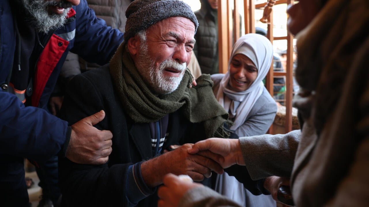 grief stricken relatives gather outside a hospital in khan yunis following an israeli air strike on southern gaza photo afp