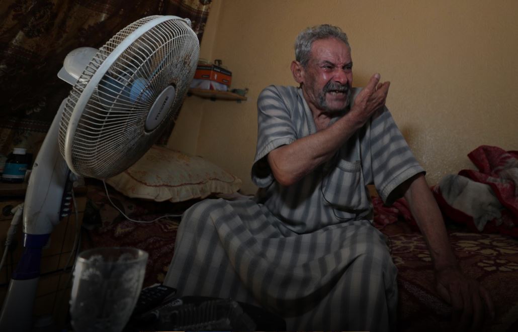 palestinian man abdel rehman tloly 68 reacts as he speaks to reuters at his apartment in sheikh zayed housing estate in the northern gaza strip photo reuters