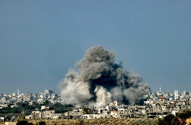 A picture taken from the southern Israeli city of Sderot shows smoke ascending over the northern Gaza Strip following an Israeli airstrike. PHOTO: Reuters