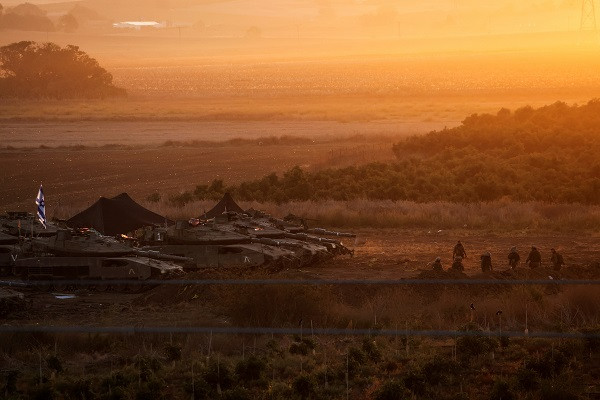 A formation of Israeli tanks is positioned near Israel's border with the Gaza Strip. PHOTO: Reuters