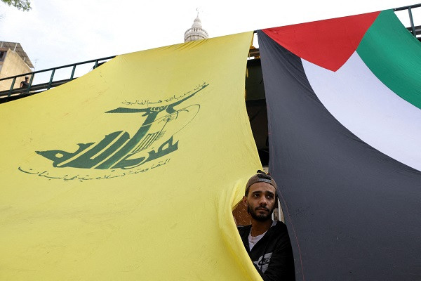 Hezbollah supporters protest in solidarity with Palestinians in Gaza. PHOTO: Reuters