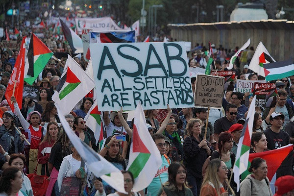People march in support of Palestinians in Gaza, calling for a ceasefire and that Mexico cut ties with Israel, in Mexico City, Mexico. PHOTO: Reuters
