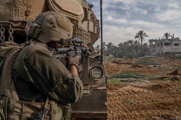 An invading Israeli soldier in the Gaza Strip. PHOTO: Reuters