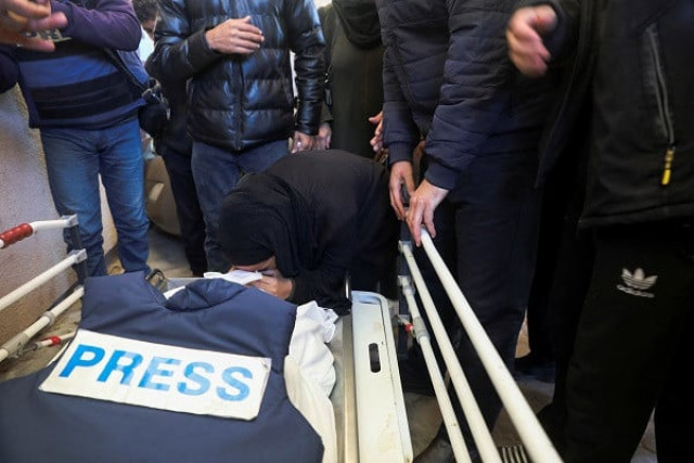 a mourner reacts next to the body of slain palestinian journalist akram al shafii who died in an israeli strike at the european hospital in khan younis in the southern gaza strip january 6 2024 photo reuters a mourner reacts next to the body of slain palestinian journalist akram al shafii who died in an israeli strike at the european hospital in khan younis in the southern gaza strip january 6 2024 photo reuters
