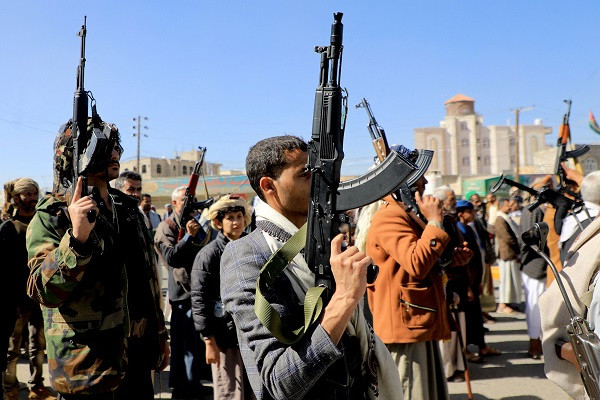 Houthi fighters during a impetus in oneness with a Palestinian people in a collateral Sanaa. PHOTO: AFP