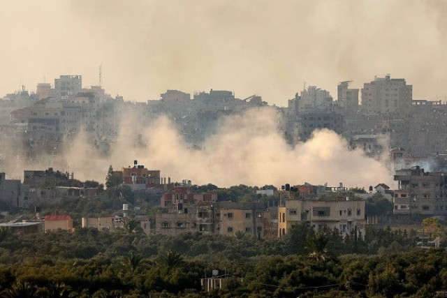 a picture taken from southern israel on the border with the gaza strip shows smoke billowing over the palestinian territory during israeli bombardment photo afp a picture taken from southern israel on the border with the gaza strip shows smoke billowing over the palestinian territory during israeli bombardment photo afp