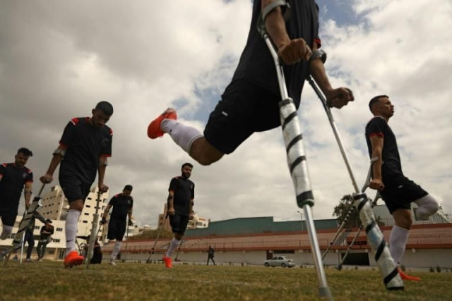 in gaza loss of a leg doesn t deter footballers