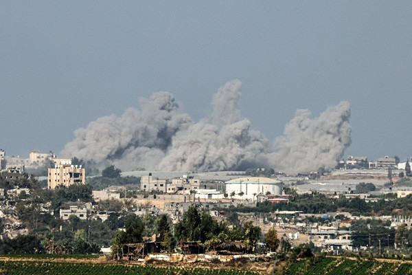 a picture taken from the southern israeli city of sderot shows smoke ascending over the northern gaza strip following an israeli airstrike photo reuters