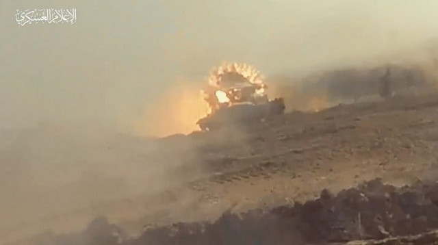 hamas fighters target israeli tanks and vehicles in gaza photo reuters hamas fighters target israeli tanks and vehicles in gaza photo reuters