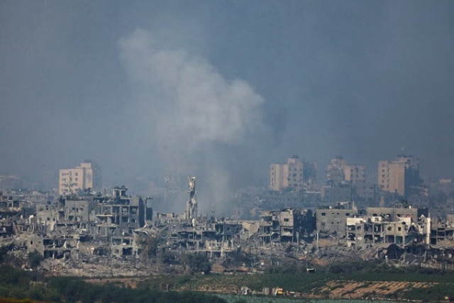smoke rises from an israeli airstrike in the gaza strip as seen from israel photo reuters smoke rises from an israeli airstrike in the gaza strip as seen from israel photo reuters