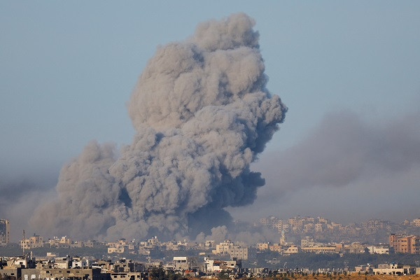 Smoke rises after Israeli air strikes in Gaza, as seen from southern Israel. PHOTO: AFP