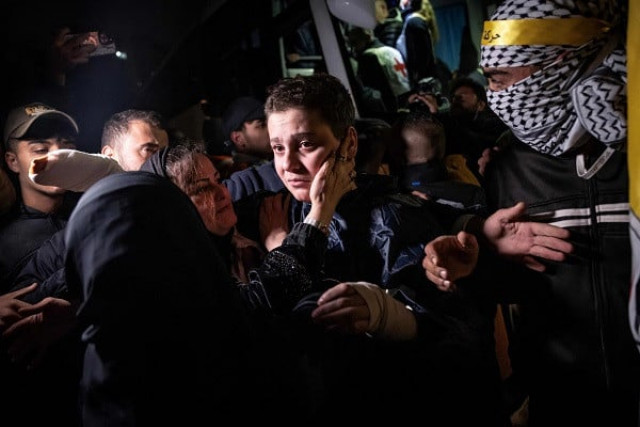 a palestinian child reacts after being released from an israeli jail in exchange for israeli captives released by hamas from the gaza strip photo afp a palestinian child reacts after being released from an israeli jail in exchange for israeli captives released by hamas from the gaza strip photo afp