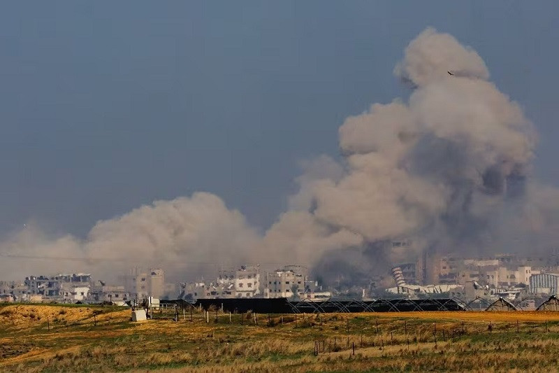 Smoke rises in Gaza as seen from southern Israel, Dec 6, 2023. PHOTO: REUTERS