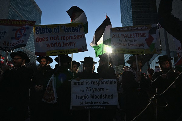 Pro Palestine Jewish protesters demonstrate outside UN headquarters prior to a vote at the General Assembly in New York City. PHOTO: AFP