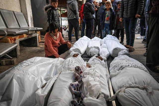 palestinian mourners react over the bodies of members of the al orjani family after they were killed during israeli bombardment photo afp palestinian mourners react over the bodies of members of the al orjani family after they were killed during israeli bombardment photo afp