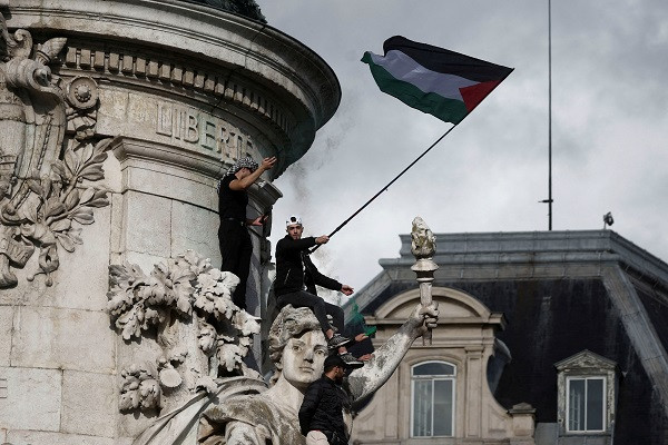 French labour unions and organisations call for peace and an immediate ceasefire in Gaza during a demonstration at Place de la Republique in Paris. PHOTO: Reuters