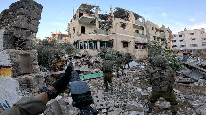Israeli soldiers operate in the Gaza Strip amid the ongoing conflict between Israel and the Palestinian resistance group Hamas.  PHOTO: Reuters