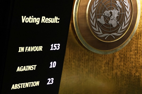 The results of a draft resolution vote are seen on a screen as the UN General Assembly holds an emergency special session on the Israel-Hamas conflict at the United Nations headquarters. PHOTO: AFP