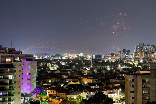 Israel's Iron Dome anti-missile complement intercepts rockets launched from a Gaza Strip. PHOTO: Reuters